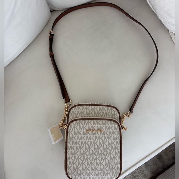 Michael Kors Handbags - Michael Kors Beige Logo Crossbody with Brown Trim